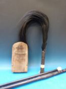 An ivory mounted rosewood walking cane, fly swat,