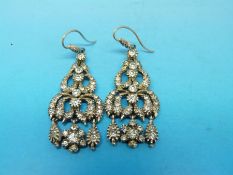 A pair of white metal and paste drop earrings
