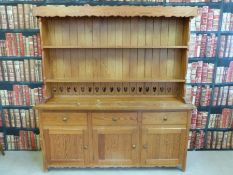 A three drawer pine dresser