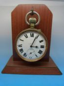 A Goliath pocket watch on a stand