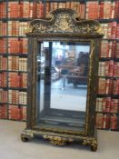 A large and impressive glazed lacquered chinoiserie cabinet with glazing to three sides,
