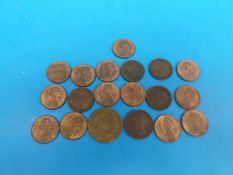 A collection of bronze bun head farthings etc,