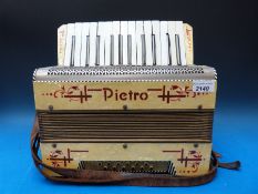 A Pietro 12 bass c1930 piano accordion in ivory pearloid finish (no case)