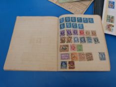 A box of loose stamps, albums, stock cards,