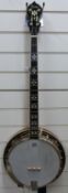 A Dean five string tenor banjo,