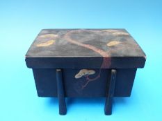 A 19thC Japanese lacquer box standing on tapering feet with gilt decoration, Meiji period, 12.