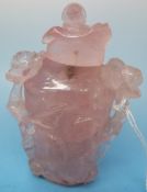 A Chinese rose quartz snuff bottle with carved floral decoration