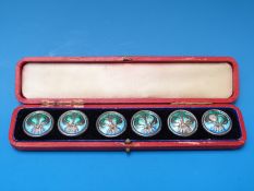 A set of cased white metal and enamel buttons in the Art Nouveau style