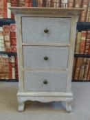 Two side tables and a modern bedside chest of drawers
