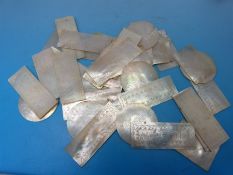 Thirty-seven Chinese mother-of-pearl gaming counters of square, rectangular and circular form,