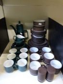 A quantity of retro brown dinnerware and a quantity of retro turquoise coffee ware