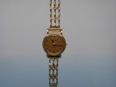 A 9ct gold Lourdes Zenith ladies' wristwatch (14.