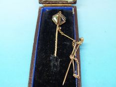 A yellow metal Masonic stick pin set with various agate