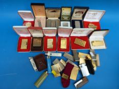 A collection of vintage lighters including 14 various Dunhill examples,