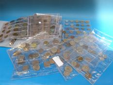 A large amateur collection of largely world coins pre-Euro etc in an album