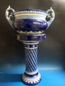 A French jardinere and stand in blue and white colourways