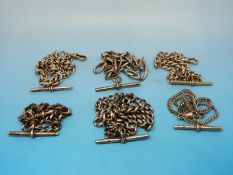 Six sized silver Albert chains