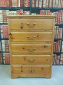 A modern pine chest of five drawers, (W74 x D 40 x L 105.