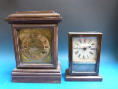 A walnut cased Ansonia mantel clock together with a Teutonia German example