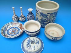 A collection of blue and white Chinese porcelain including a jardiniere, vases,