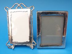 Two hallmarked silver photo frames, London 1898 and Birmingham 1926, each to suit a 4