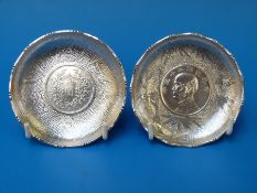 A pair of Chinese silver coin inset pin trays, marked Sterling Hong Kong,