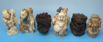 A collection of netsukes and similar items.