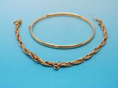 A 9ct gold bangle and a 9ct gold bracelet (9g)