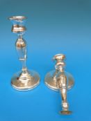 A pair of hallmarked silver candlesticks,