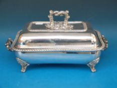 A silver plated food warmer/ entree dish with gadrooned edge
