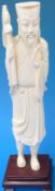 A Chinese ivory figure of a warlord or warrior (24cm tall)