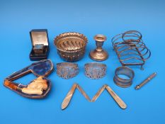 A hallmarked silver four division toast rack, hallmarked silver bowl,