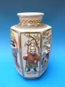 A Japanese Satsuma vase of hexagonal form with relief moulded figures (31cm tall)