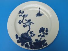 An 18thC Chinese blue and white plate decorated with birds amongst foliage (35cm diameter)