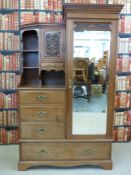 A late C19th walnut compactum, comprising bevelled mirror door opening to reveal hanging space,