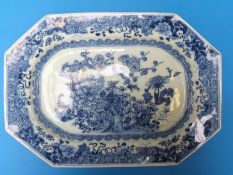 An 18thC Chinese blue and white platter with flowers and rock work painted to the centre (23 x