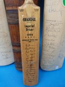 A collection of cricket bats including signed examples and a miniature example by Australian