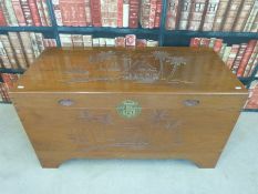 A carved camphor wood chest c1960s (W102 x D47 x H46)