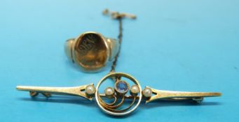 A yellow metal brooch marked 15ct set with a topaz and seed pearls and 9ct signet ring (3.