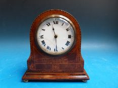 A small Edwardian arch top mantel timepiece in inlaid case with keyless Swiss movement by Buren,