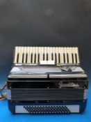 A c1960s Frontalini 80 bass two voice piano accordion