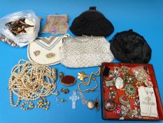 A Japanese lacquer box containing costume jewellery, bags,