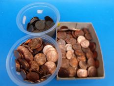 A good quantity of George V English pennies together with a quantity of near uncirculated Elizabeth