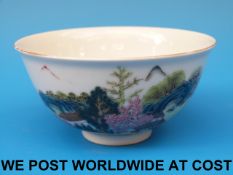 A Chinese bowl with enamelled decoration and Qianlong mark