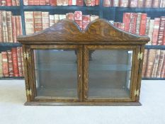 A glazed oak hanging cupboard with glass shelves (W74 x D23 x H52cm)