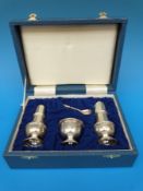 A cased three piece hallmarked silver cruet