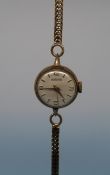 A ladies' yellow metal Roamer watch, marked 375 to strap and case (12.