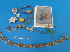 Four silver necklaces set with various semi-precious stones, brooches, two watches,