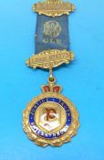 A 1923 Masonic 9ct gold medal inscribed for the Blackpool Lodge (approximately 14g all in)