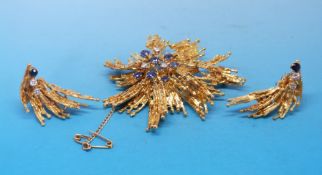 A yellow metal brooch marked 18ct by G.